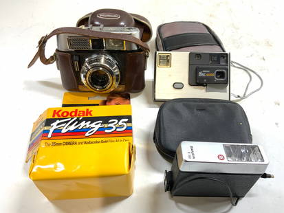 Lot 4 Assorted Vtg Cameras & Cases: Lot includes 1 Kodak Fling 35, 1 KODAK DISC 4000 camera & case, 1 Bauer E160 camera & case, & 1 Voigtlander Vito CLR Camera with case. Largest camera measures approximately 5 inches wide 4 inches tall