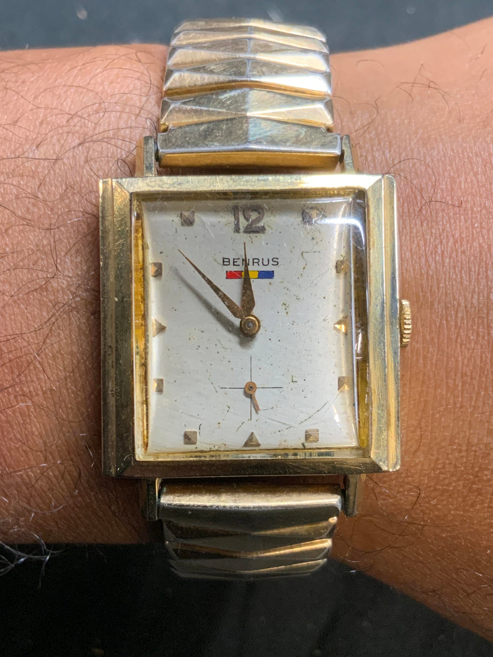 BENRUS Vntg Gold Plated Wristwatch: Watch face reads BENRUS. Piece is vintage. Watch is gold plated. Piece has stretching band. Vintage gold plated BENRUS wristwatch. Face Measures approximately 1.15 inches long 1 inch wide. Watch, wris