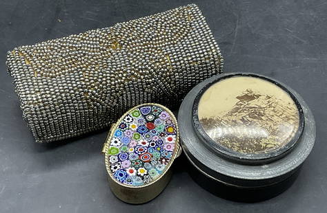 Lot 3 Vintage Trinket Boxes & Beaded Lipstick Case: One seed beaded lipstick case with a mirror to the interior, a metal and Millefiori glass trinket box, and a metal OLD MAN OF THE MT WHITE MTS trinket box. Plastic insert to the Millefiori box. The li