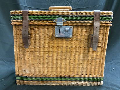 Vintage Woven Wicker Tackle Box W Lid: Tackle box is vintage. Piece is crafted from woven wicker. Top of piece has handle. Box has hinged lid with locking mechanism interior has 5 compartments and metal box. Piece measures approximately 15