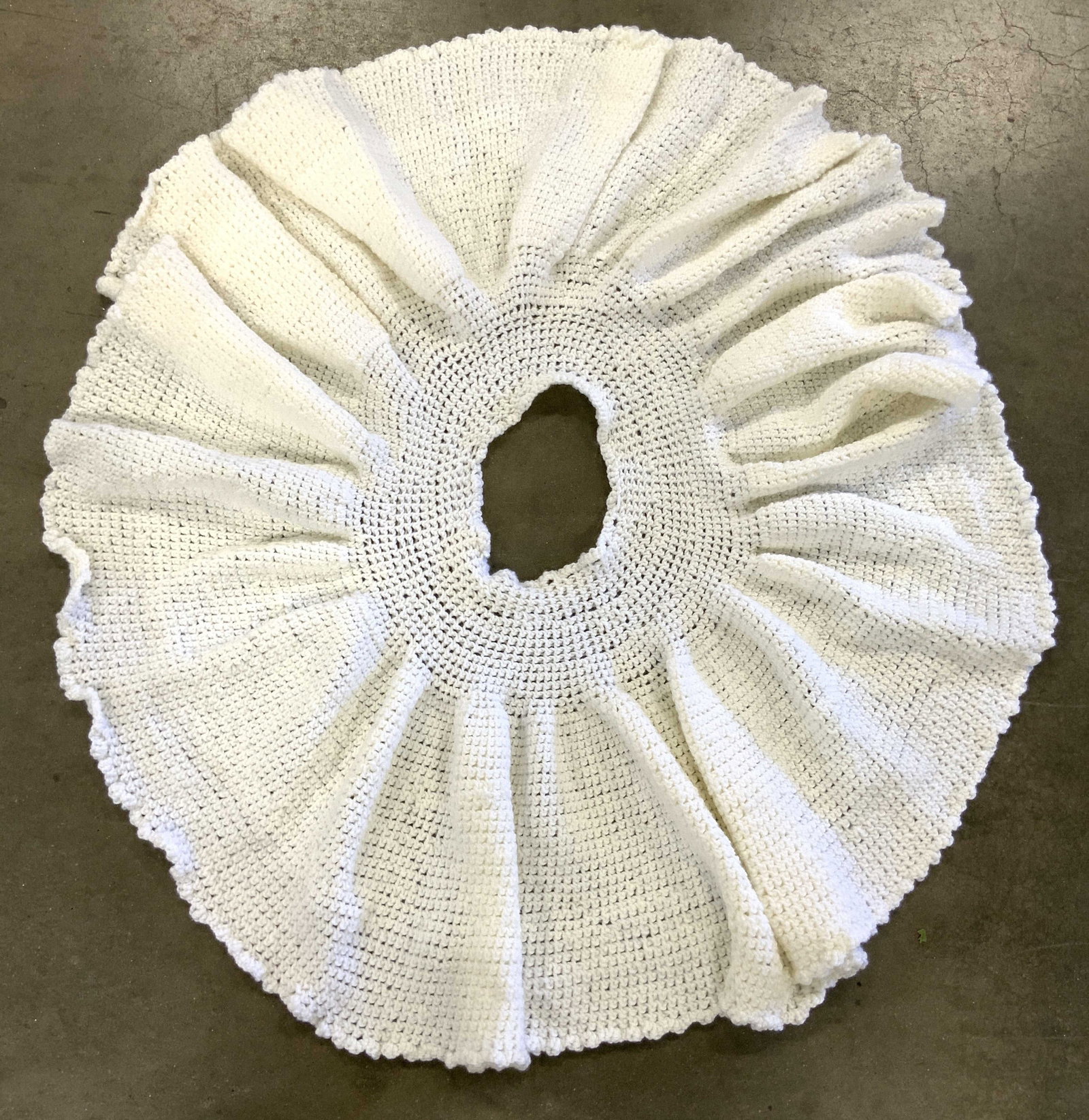 Vntg Handmade Woven Wearable Accessory: Piece is cream toned, appears to be woven yarn, possibly crochet. Accessory has hole in center. Appears to be vintage. Possibly hand woven. Measures approx 38 inches diameter. Pancho, skirt, tree skir