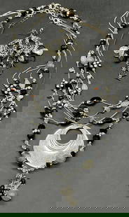 Lot 5 Vintage Silver Tone Metal Beaded Jewelry: Three necklaces and two pairs of earrings. Crafted from silver tone metal and beads. Backings for pierced ears. Necklaces have clasp closures. Longest necklace measures approx. 20 inches in length. Th