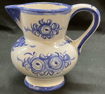 Vestal Portugal Blue & White Ceramic Pitcher: Vestal ceramic pitcher in blue and white with floral design. Hand painted, signed. Made in Portugal. Measures approx 6 x 4.5 x 5.75 inches. Some scratching observed. Vesta, pitcher, ceramic pitcher, f