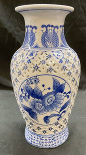 Nantucket Pierced Porcelain Floral Vase: Nantucket pierced porcelain vase with floral motif. Hand painted in blue and white. Signed. Measures approx 5.5 x 11.5 inches. Some scratching observed. Nantucket vase, porcelain vase, pierced vase, f