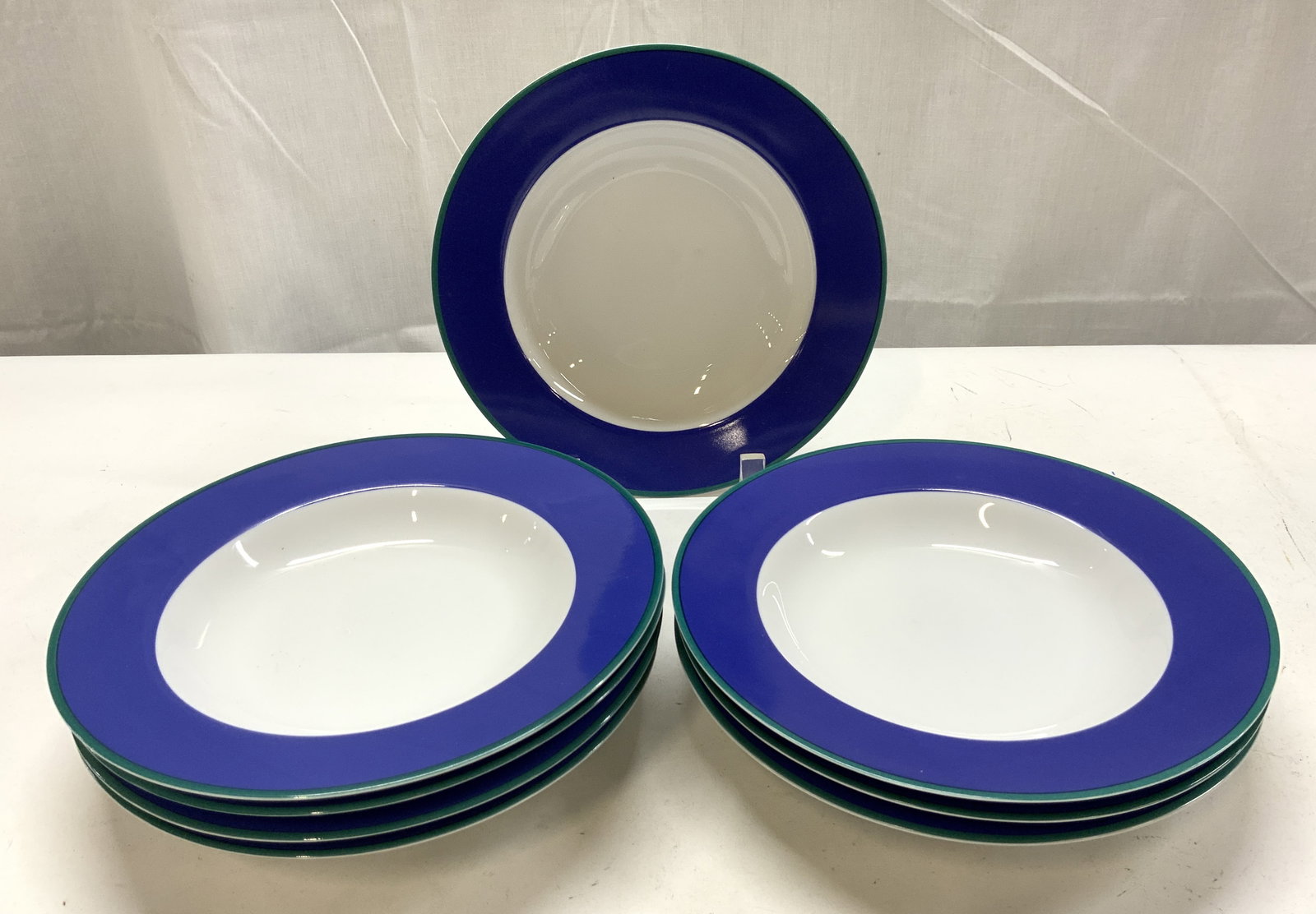 Lot 8+ PIER 1 Two-Tone Dinner Bowls BANGLADESH: Lot 8+ PIER 1 Two-Tone Dinner Bowls BANGLADESH Bowls feature a white center smooth finish & a blue rim with a green trim. Plates are two-toned. Underside is signed & marked. Reads PIER 1 MONNO BANGLAD