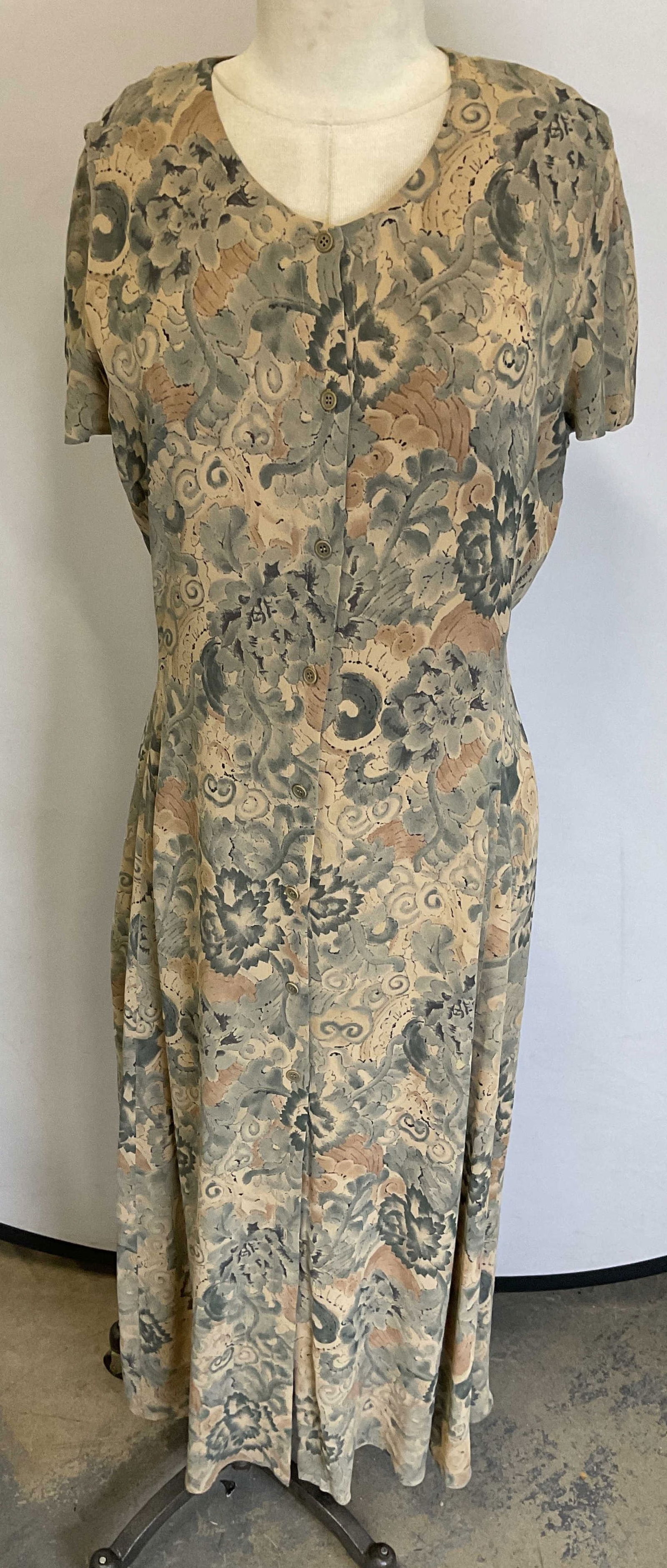 Calvin Klein Floral Silk Maxi Dress: Calvin Klein short sleeve maxi dress in tan and blue with floral print. Size 6. 100% silk. Button front. Some wear including blemishes. Calvin Klein dress, designer dress, silk dress, maxi dress, shor