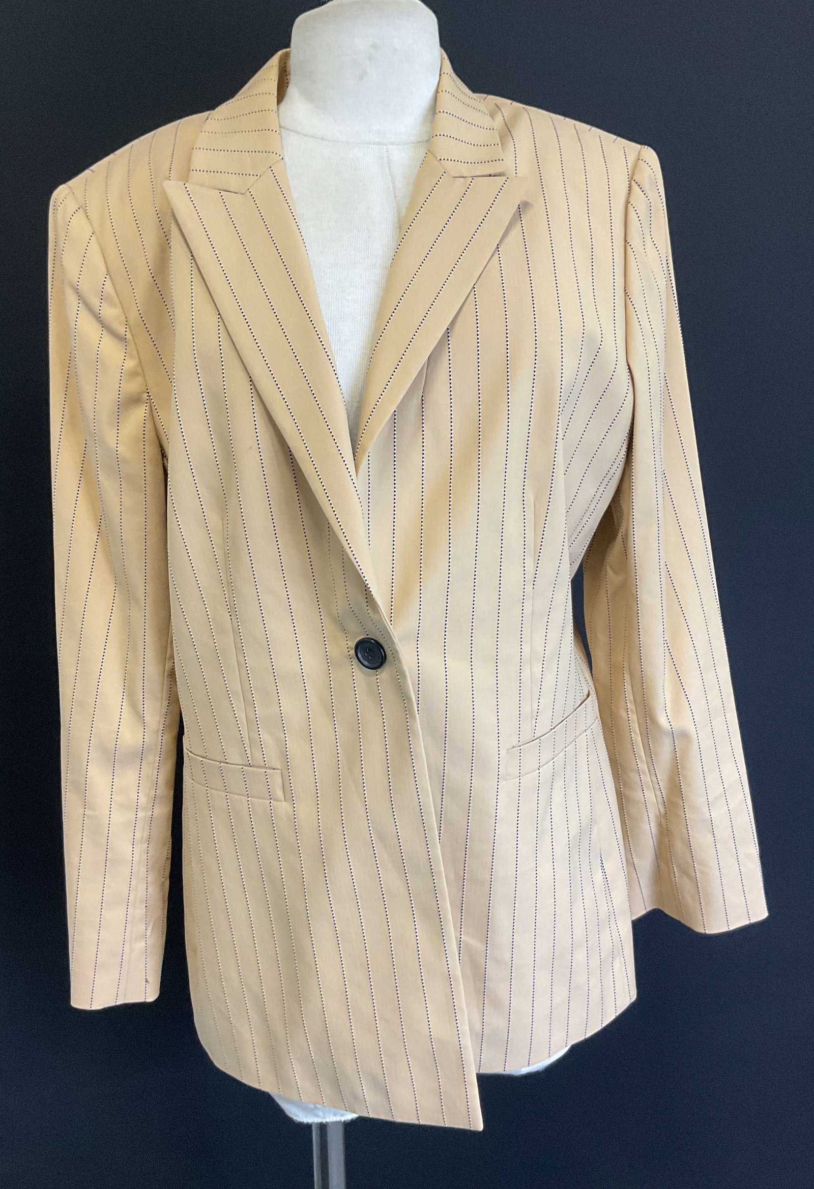 Vtg TAHARI Tan Striped Suit Jacket: Vintage TAHARI tan striped suit jacket. Tan jacket with black and white lined design detail. Synthetic mix material. Acetate, cotton. Fully lined. Buttoned sleeves. Size 14. Made in Taiwan. Some surfa