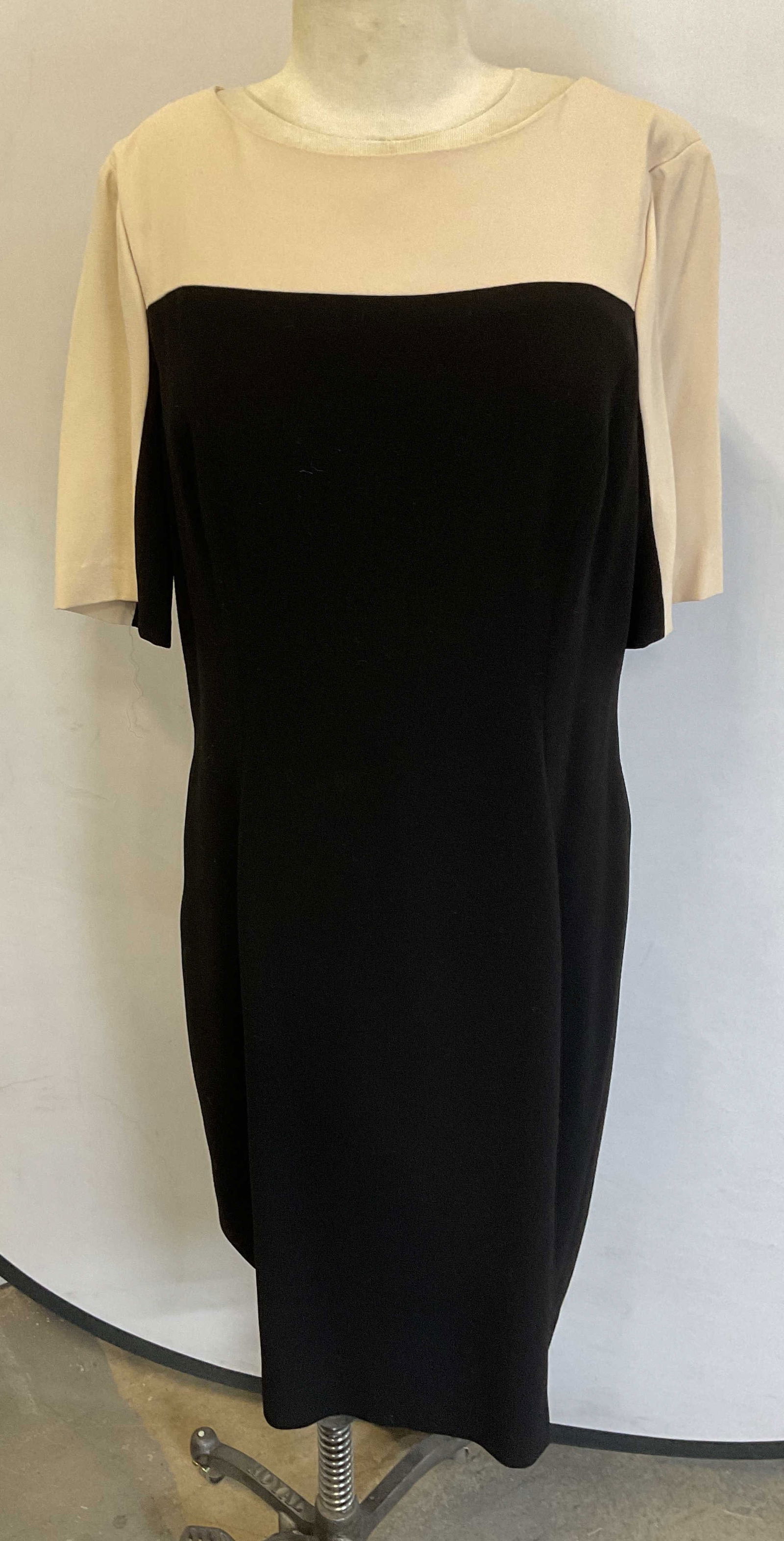 DKNY Black Tan Short Sleeve Midi Dress: DKNY black and tan color clock short sleeve midi length dress. Size 14. Synthetic material. Some wear consistent with exposure. DKNY, DKNY dress, designer dress, designer fashion, midi dress, short sl