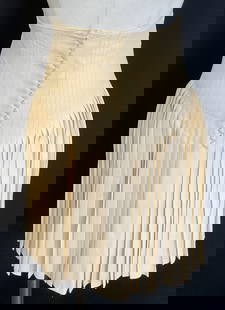 Balenciaga Pleated Cream Silk Midi Skirt, France: Balenciaga cream midi length skirt with pleated and front button detail. Size 38. 100% silk. Some blemishes. Hook needs repair. Balenciaga skirt, Balenciaga, designer skirt, designer fashion, silk ski