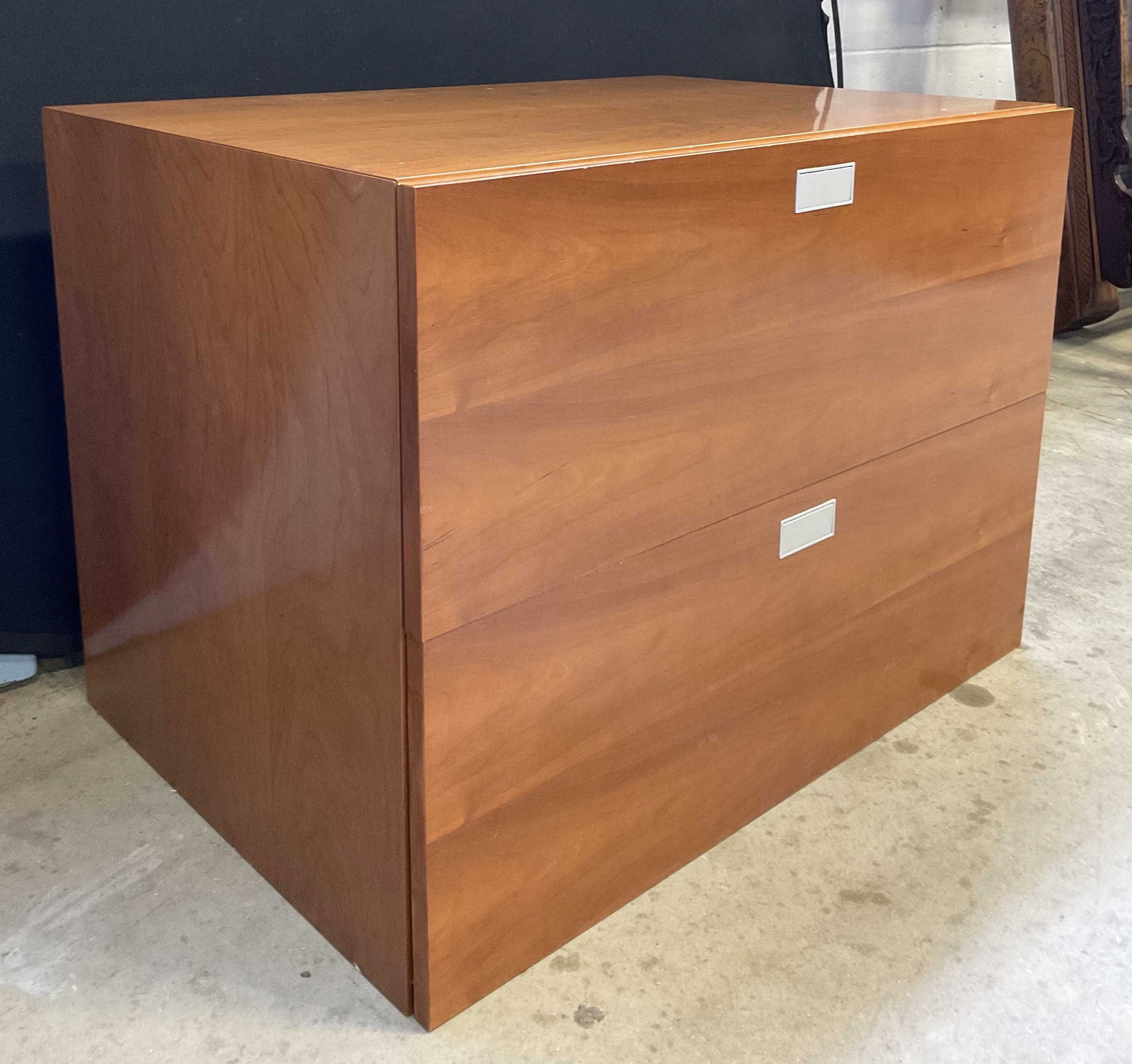 Two Drawer Dresser / Chest: Two Drawer Dresser / Chest. Crafted from wood and veneer. Silver tone drawer pulls to the obverse. Measures approx. 24D x 35W x 25H in. Chipping and surface wear present. Drawers need adjustment. Furn