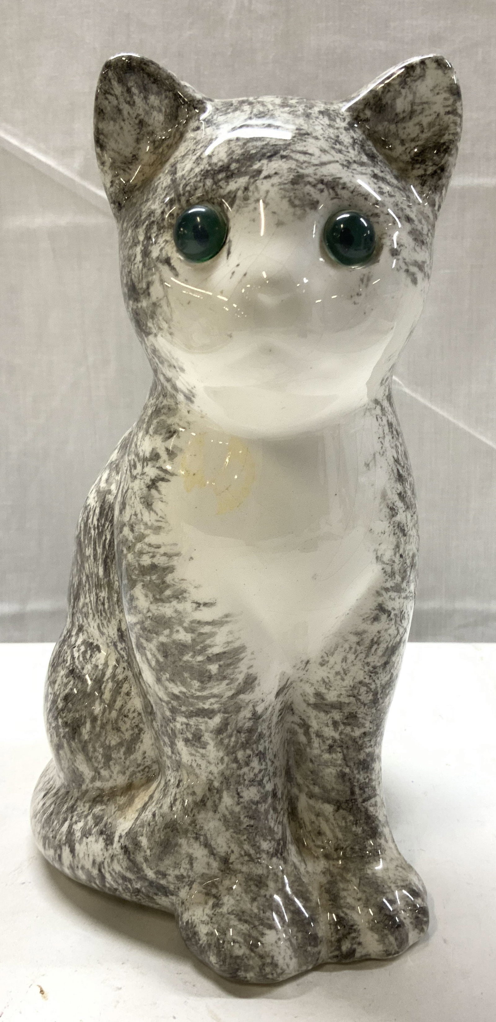 ELPA ALCOBACA Grey & White Cat Figurine PORTUGAL: ELPA ALCOBACA Grey & White Cat Figurine PORTUGAL Figurine depicting a grey & white speckled cat with green glass eyes. Signed & marked on underside. Reads ELPA, MADE IN PORTUGAL. Surface wear consiste