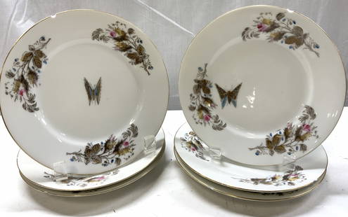 Lot 6+ Butterly & Floral Motif Porcelain Plates: Lot 6+ Butterly & Floral Motif Porcelain Plates Porcelain plates feature decorative motifs including a central butterfly & surrounding floral elements. Trim of plates have gold accents. Surface wear c