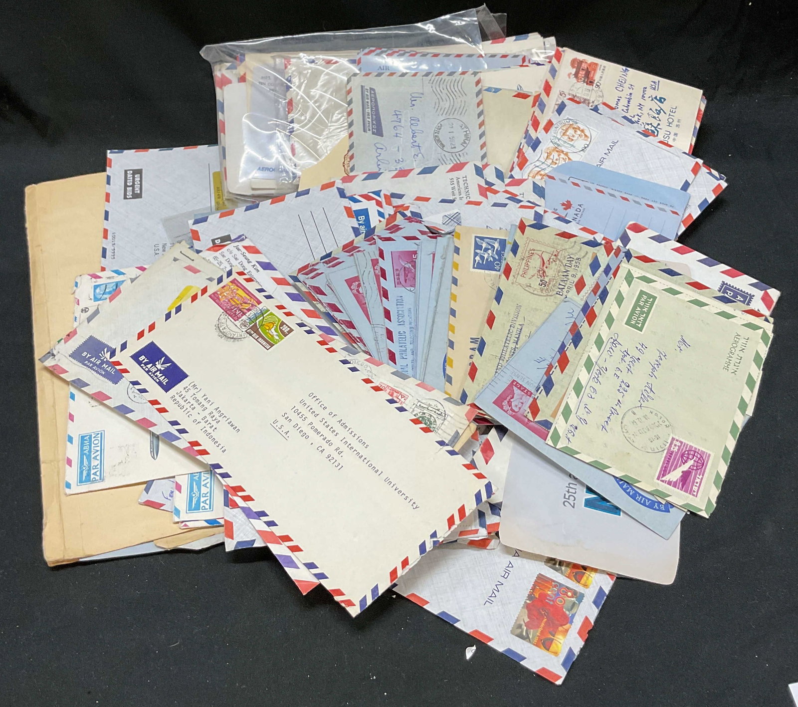 50+ Vtg Blue Letters Aerograms Mail Stamps USA+: Group Lot of 50+ vintage blue letters aerograms mail stamps. Some blank envelopes. Variety of stamps from different countries including, New Zealand, USA, Philippines, Indonesia, and more. All unique 
