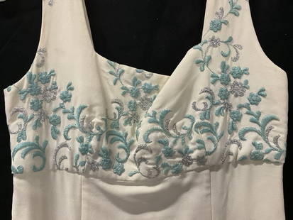 Vintage Floral Embroidery Dress: Vintage Floral Embroidery Dress, cream hued dress with blue and silver tone metallic embroidery throughout. Zipper closure. Measured flat approx. 13 inches across the chest and 54 inches in length. No