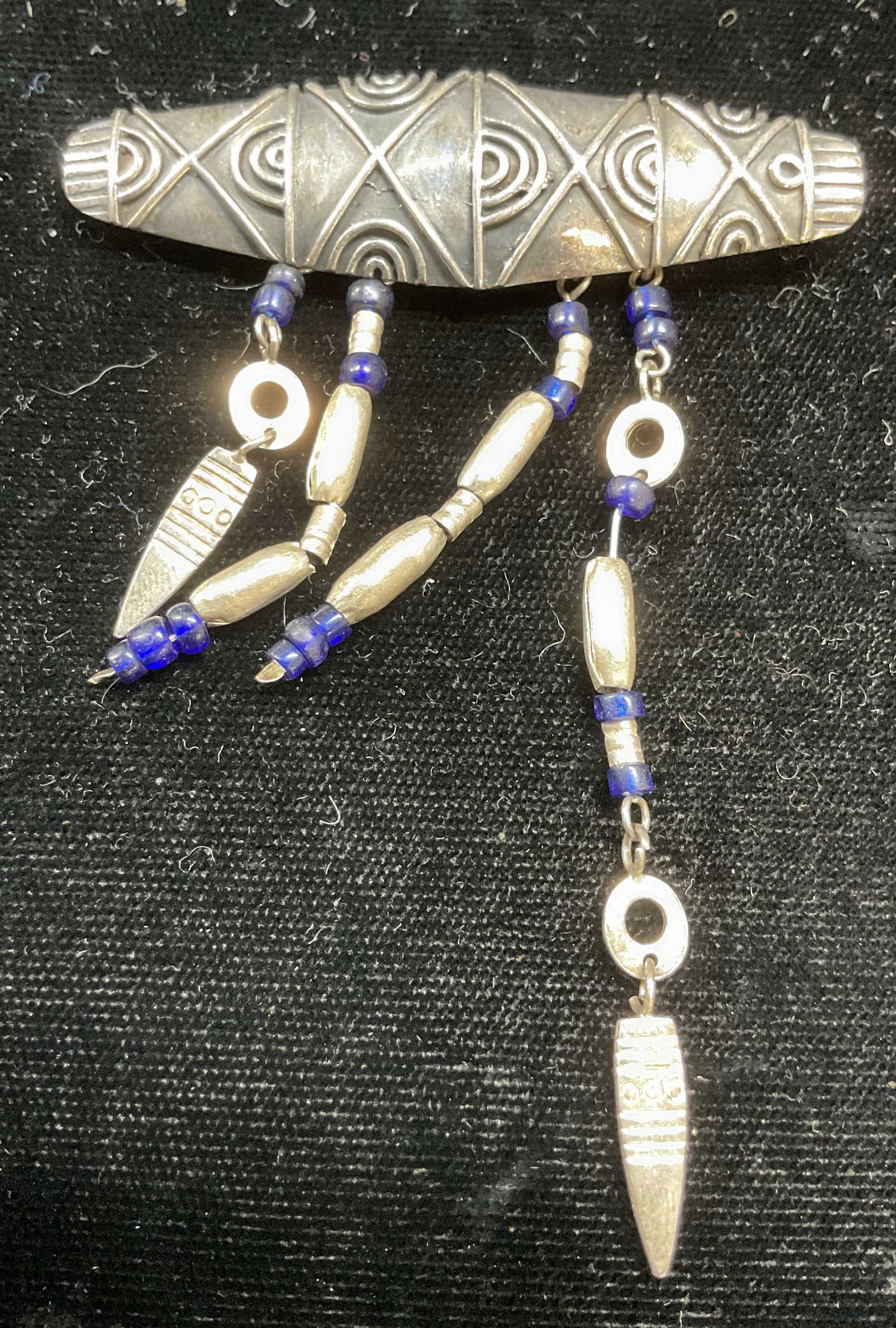 Vintage Sterling Silver Blue Beaded Brooch: Vintage sterling silver brooch with sterling and blue beads. Marked sterling. Measures approx 3 x 2.25 inches. Total weight 13 grams. Some wear including scratching observed. Some pieces need replacem