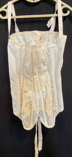 Vtg Surprised White Lace Panel Boned Corset: Vintage Surprise white corset with boning and lace panels. Hook and eye closure. Size 32D. All synthetic material, Some wear including blemishes. Lingerie, intimates, ladies fashion. -10h