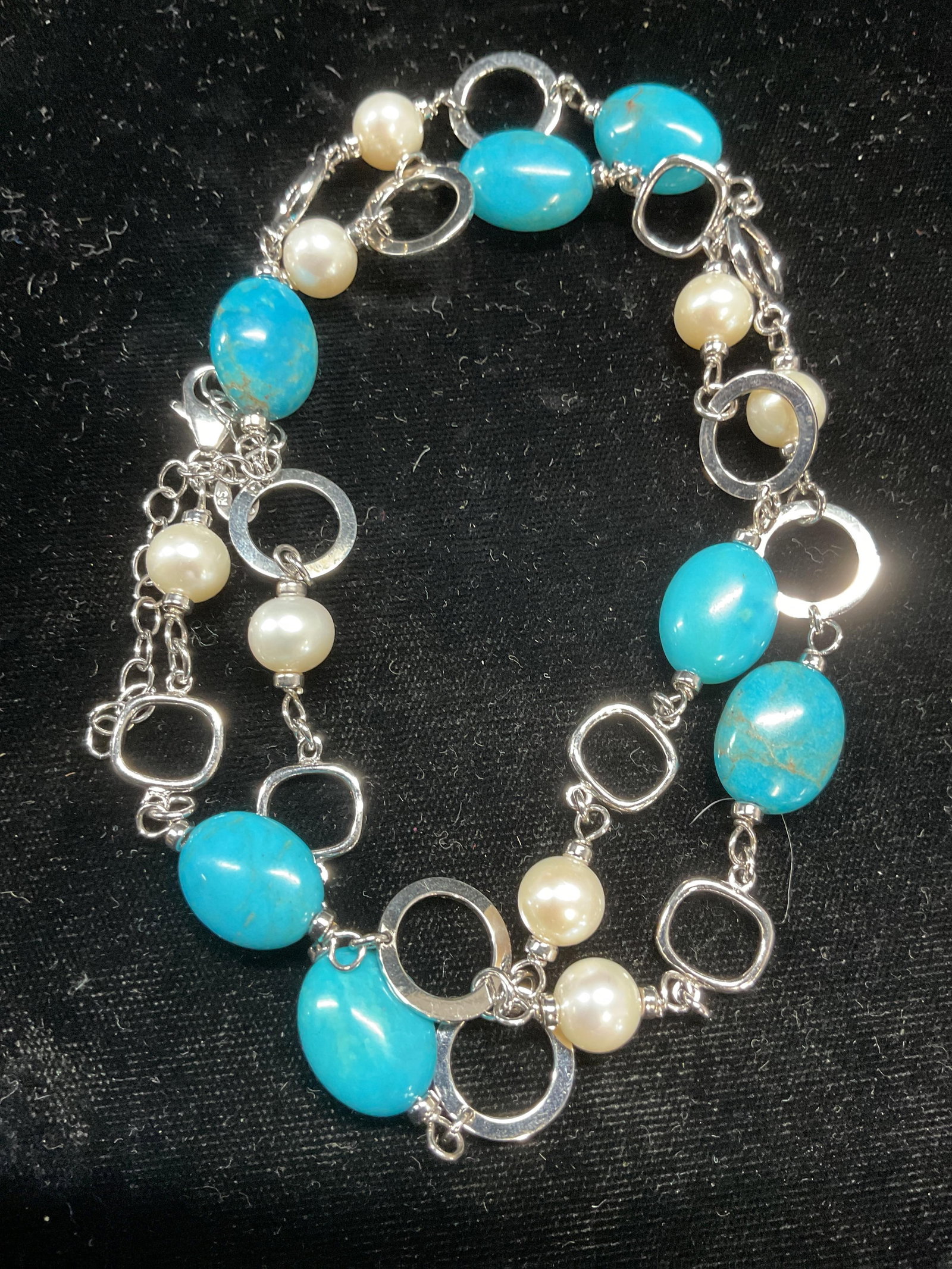 RS Sterling Silver Pearl & Turquoise Necklace: Signed RS sterling silver necklace with pearls and turquoise. Marked sterling on clasp. Drop length approx 12.5 inches. Total weight 38 grams. Some wear including scratching observed. Jewelry, estate 