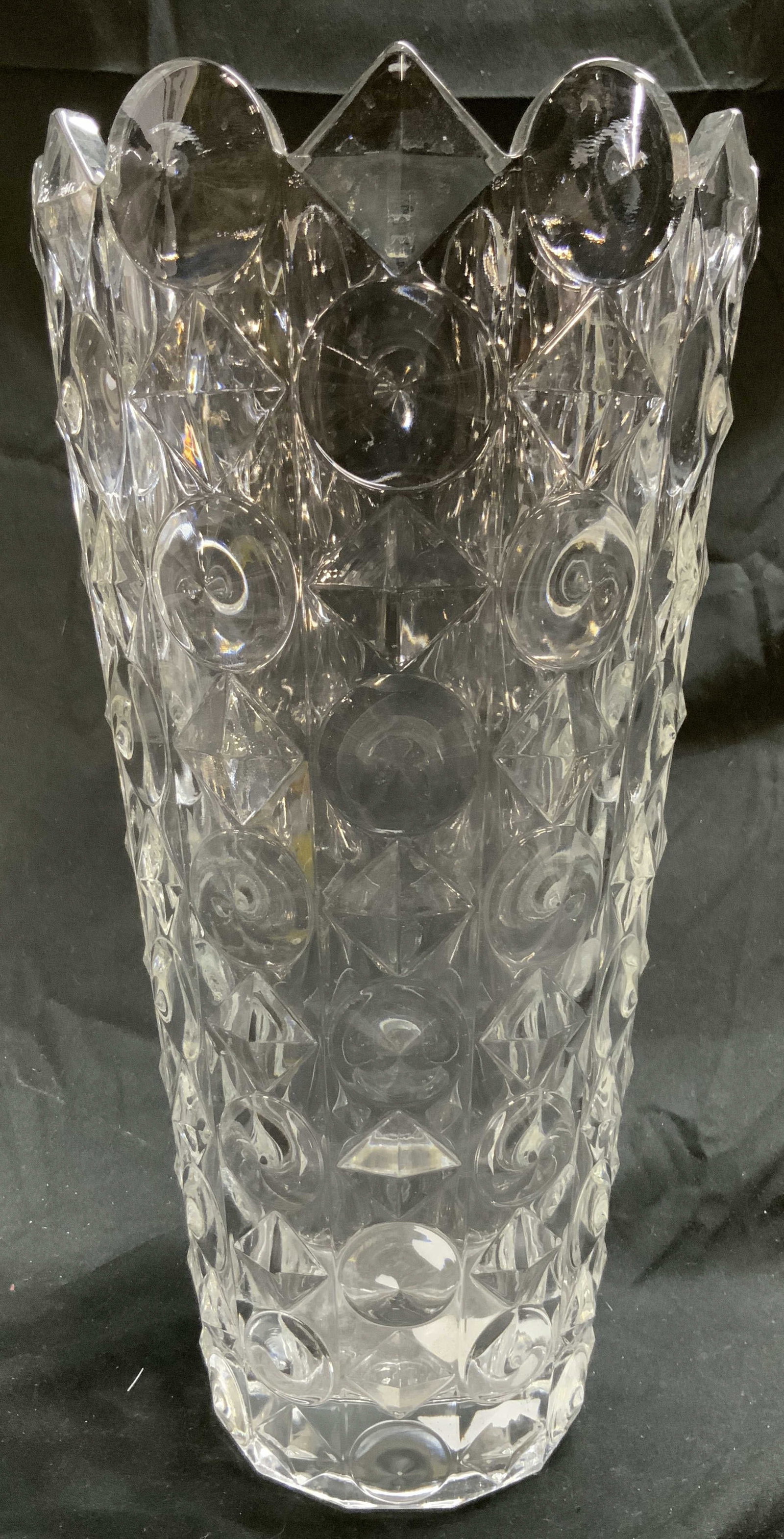 MIKASA STUDIO NOVA Counterpoint Art Gls Vase: MIKASA STUDIO NOVA COUNTERPOINT VASE , as reads on tag. Vase is glass. Piece has thick walls. Vase has beveled geometric detail to exterior. Vessel has toothed rim. Piece measures approximately 12.5 i