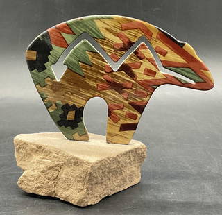THE FETISH BEAR Steel & Stone Bear Sculpture, NM: THE FETISH BEAR Steel & Stone Bear Sculpture. Sticker to the underside reads STEEL IMAGES, NEW MEXICO. Taped on ephemera reads PETROGLYPHS and THE FETISH BEAR. Measures approx. 5H x 5.5W in. Surface w