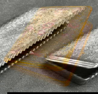 Vtg Elgin American Powder Compact Reed Case: Vintage Elgin American powder compact reed case. Etched floral pattern on brass toned metal case. Fabric or tapestry insert on lid. Butterscotch resin bottom. 4 x 3 inches. Some surface wear including