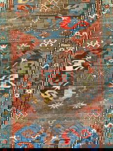 Vintage Handmade Wool Turkish Area Rug: Rug is handmade and wool. Piece is vintage, appears to be Turkish. Rug has intricate multi toned floral and geometric detailing. Edges have some short cream and brown toned fringes. Measures approx 94