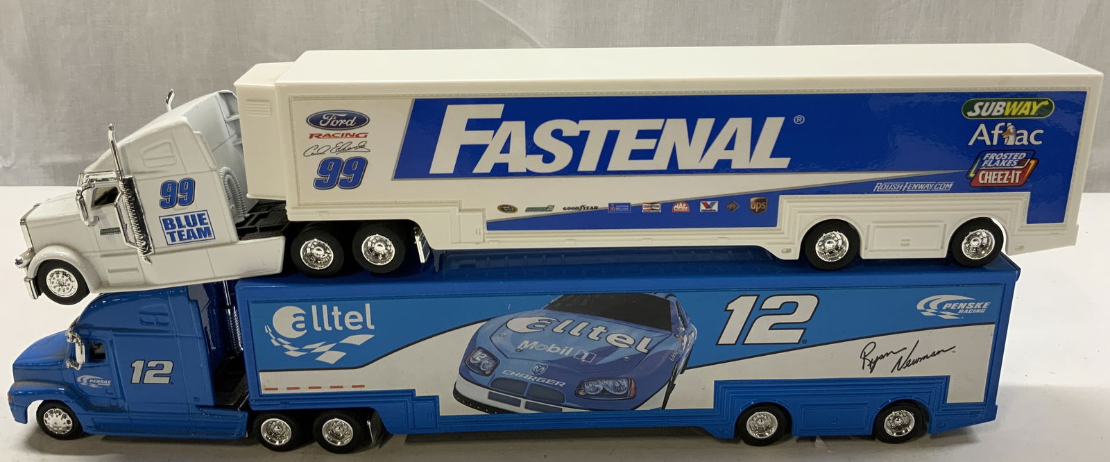 Lot 2+ NASCAR #99 & #22 1:64 Die-Cast Haulers (1 of 8)