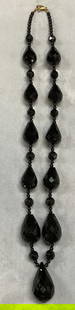 SF 14K Gold Black Onyx & Crystal Necklace: Black onyx and crystal beaded necklace with 14k gold clasp. Signed SF. Marked 14k. Drop length approx 9 inches. Total weight 60.5 grams. Some wear including scratching observed. Jewelry, estate jewelr