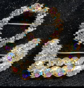 Lot 2 Vintage Silver Tone Crystal Brooches: Lot of 2 pieces. Silver tone purple crystal and faux turquoise open circle brooch and colorless crystal brooch. Larger measures approx 1.75 inches wide. Some wear including scratching observed. Jewelr