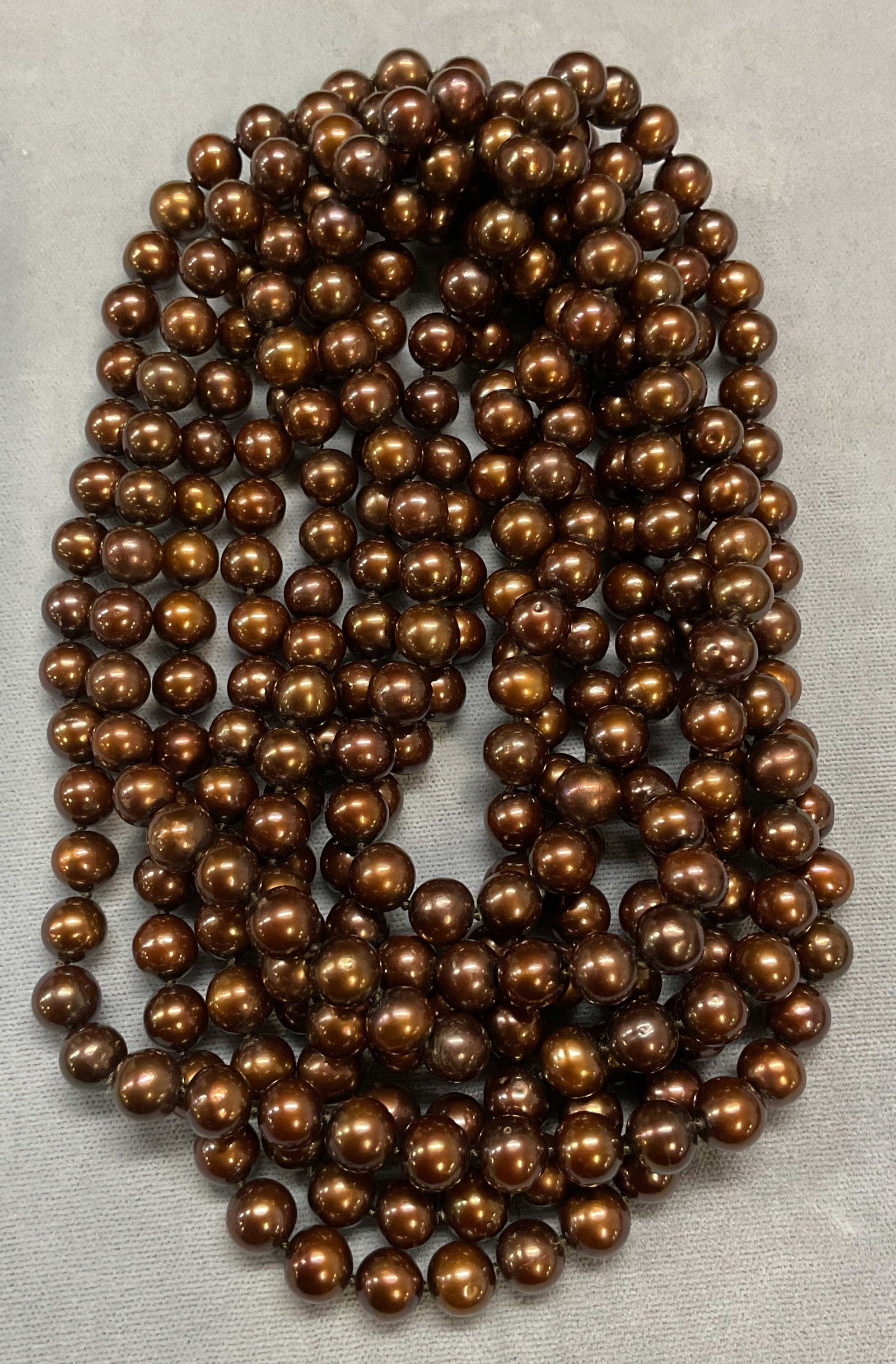 Vintage Chocolate Pearl Necklace, 50 inch Drop: Vintage dyed chocolate pearl necklace on double knotted string. Drop length 50 inches. Total weight 199 grams. Some scratching observed. Jewelry, estate jewelry, fine jewelry, cocktail jewelry, fashio