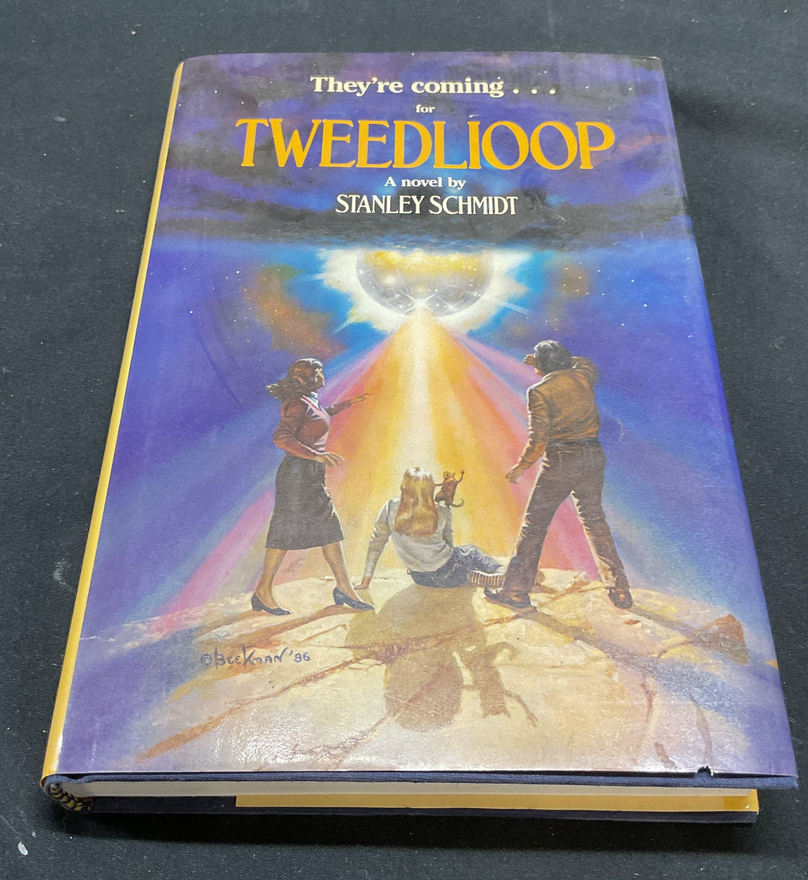 1st Printing Tweedlioop, Schmidt, 1986 Book: Hardcover first printing Tweedlioop by Stanley Schmidt. TOR, 1986. Measures approx 8.5 x 5.5 inches. Some wear to cover, pages, and binding consistent with exposure. Book, vintage book, collectible bo