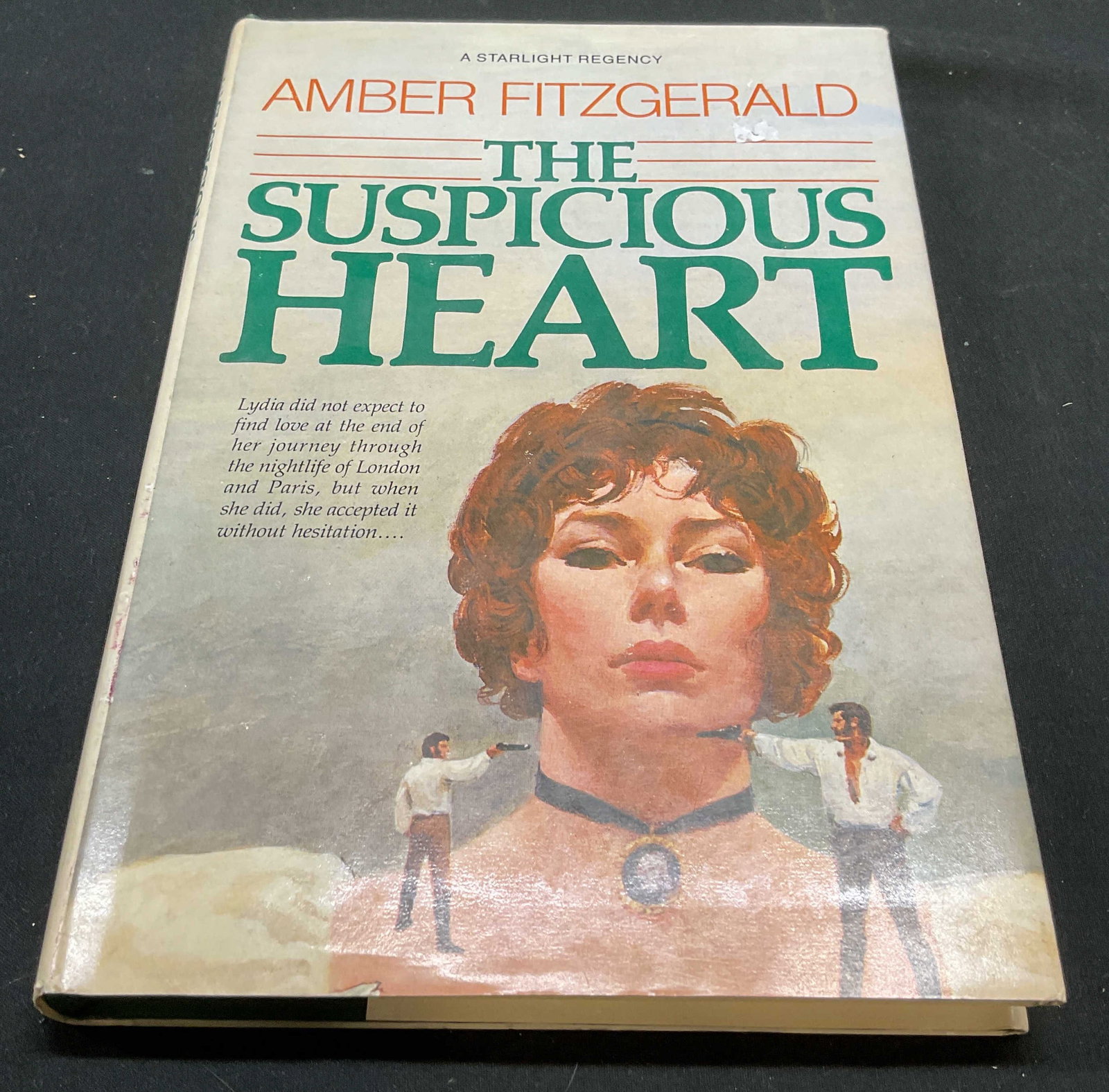 1st Edt Suspicious Heart, Fitzgerald, 1981 Book: Hardcover first edition copy of The Suspiciously heart by Amber Fitzgerald. Doubleday, 1981. Measures approx 8.5 x 5.75 inches. Some wear to cover, pages, and binding consistent with exposure. Book, v