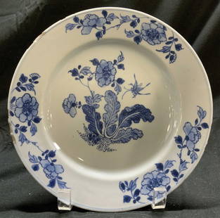 Vntg Blue & White Floral Stem Porcelain Plate: Vntg Blue & White Floral Stem Porcelain Plate Porcelain plate features blue & white floral motifs on a white background. Trim of plate has a blue faded band. No visible signature or markings. Surface