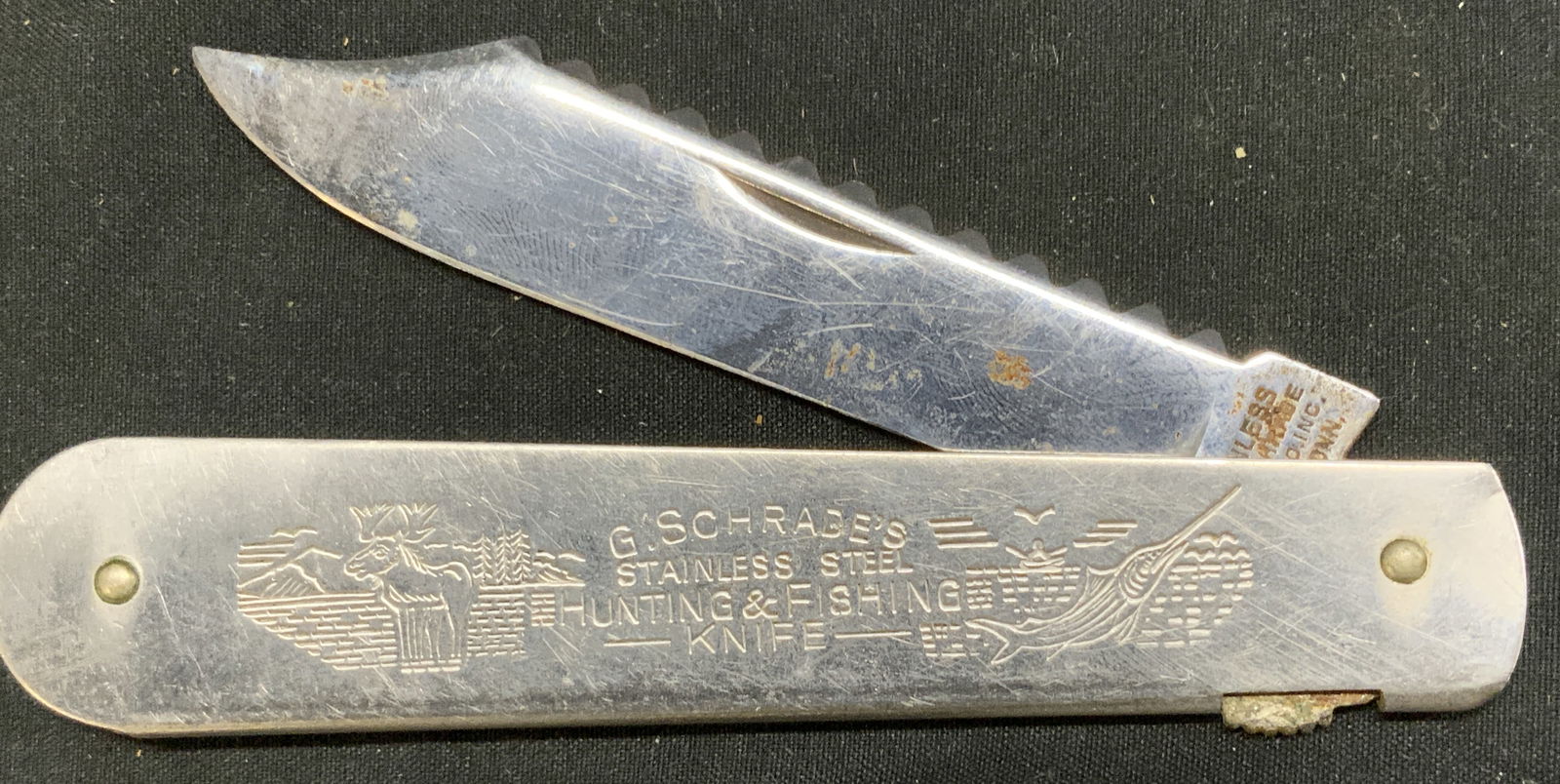 G.SCHRADES Stainless Steel Hunting Knife: G.SCHRADES Stainless Steel Hunting Knife Hunting knife engraved with moose & fish illustrations. Reads G.SCHRADES STAINLESS STEEL. HUNTING & FISHING KNIFE. Surface wear consistent to age, use & exposu