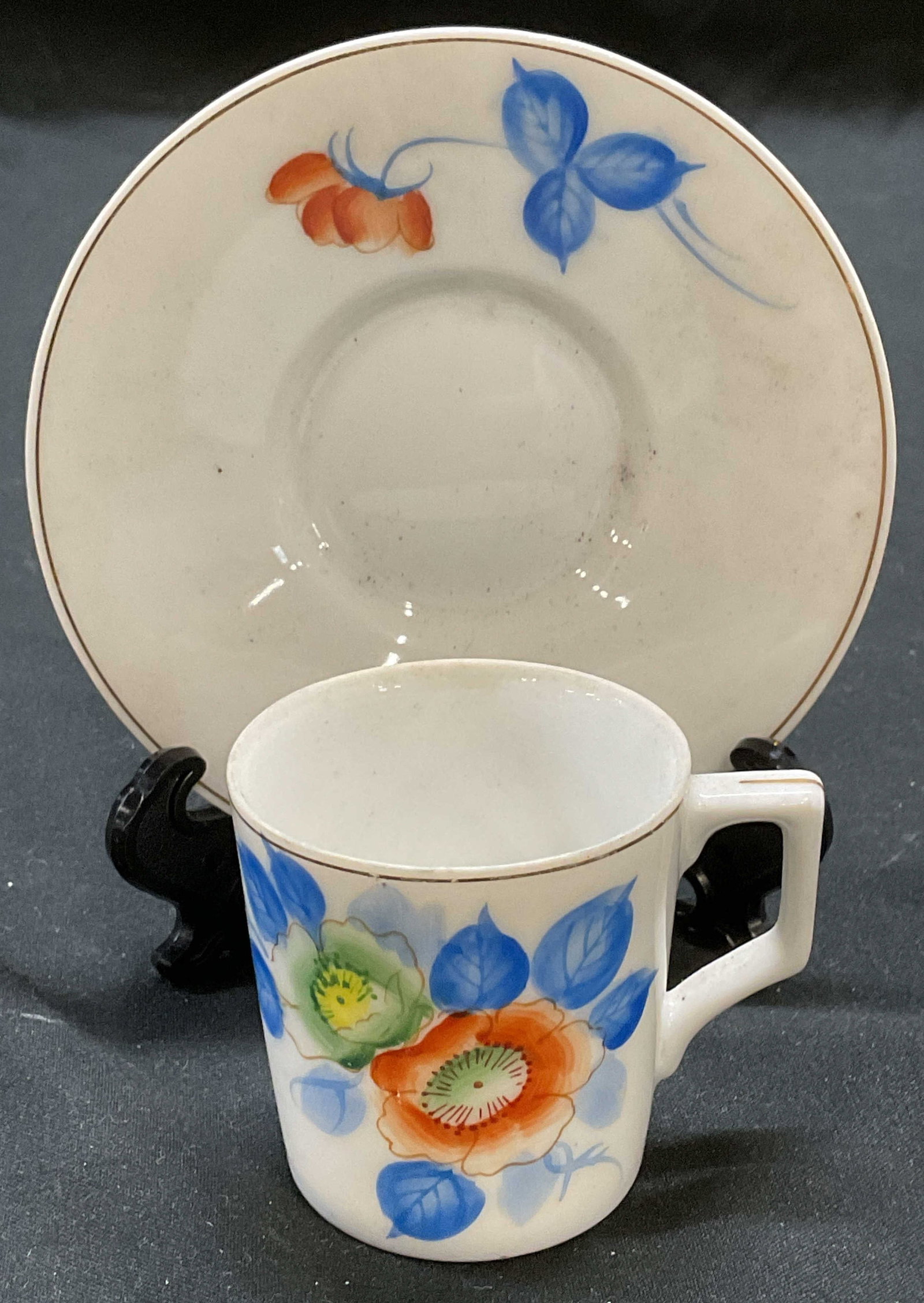 Vtg GEC Porcelain Demitasse & Saucer, Japan: Vintage GEC porcelain demitasse cup and saucer with hand painted floral pattern. Signed. Made in Japan. Saucer approx 4 inches, cup approx 2 x 2 inches. Some wear to each including scratching. GEC dem