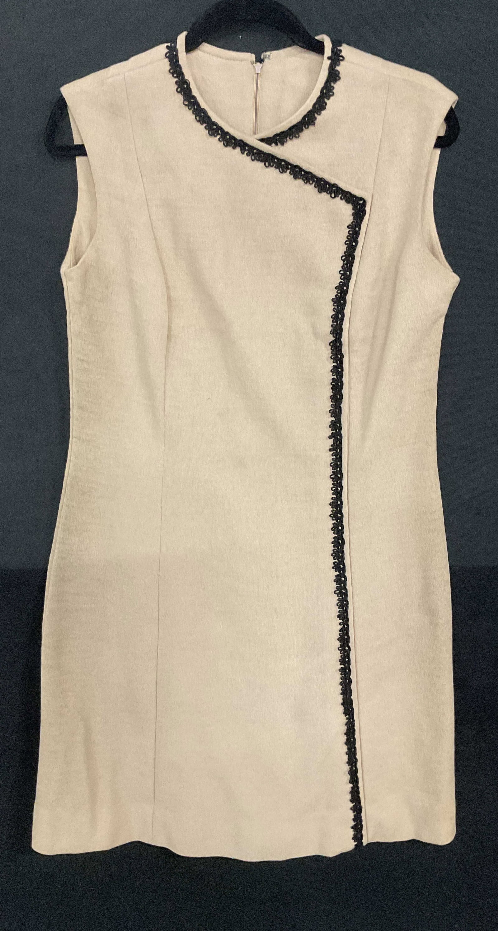 Vtg Tan Black Faux Wrap Shift Dress: Vintage tan and black lace trim faux wrap sleeveless shift dress. Feels like wool, possibly synthetic. Measures approx 17 inches across chest. Some blemishes observed. Dres, sleeveless dress, tan dres