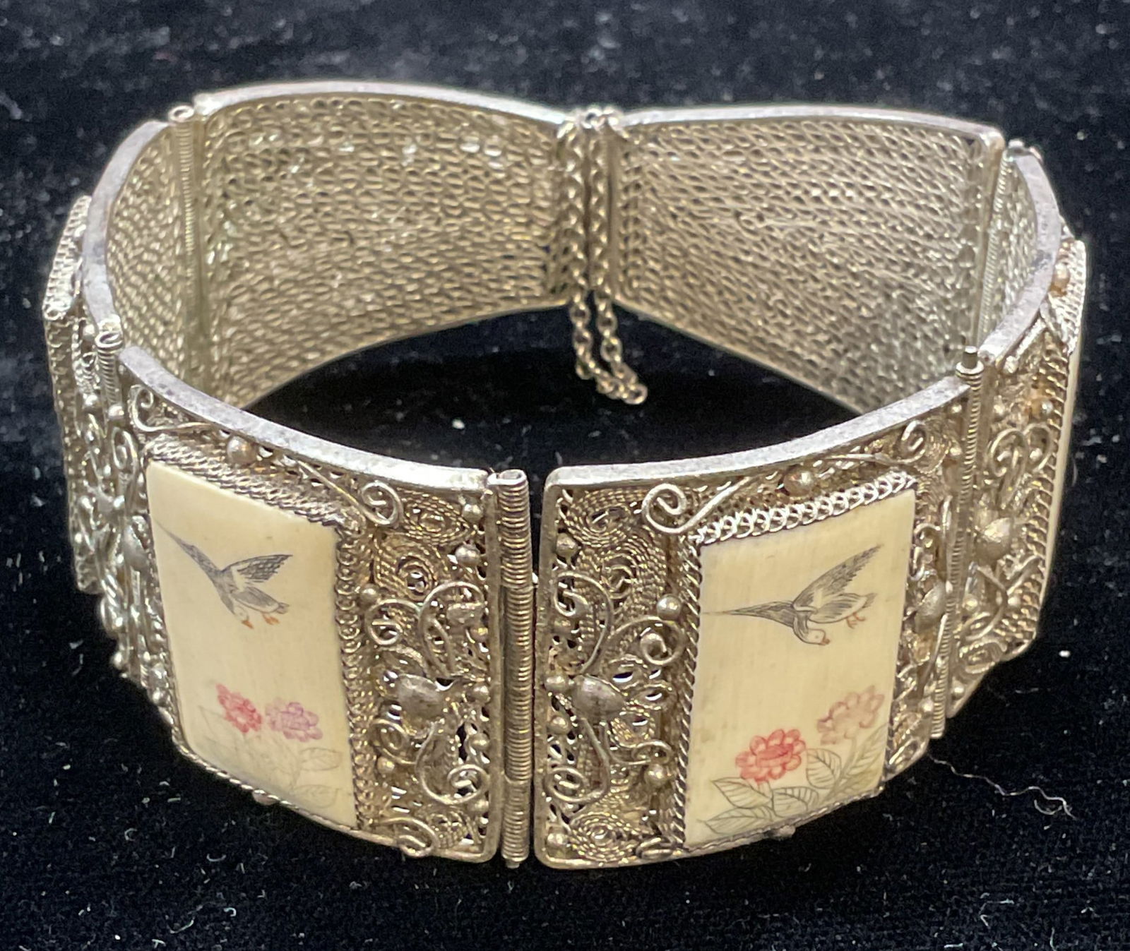 Vtg Silver Tn Filigree Bone Panel Bracelet: Vintage silver tone filigree bracelet with hand painted bone panels. Measures approx 2.25 inches wide. Some wear including scratching observed. Jewelry, estate jewelry, costume jewelry, fashion jewelr