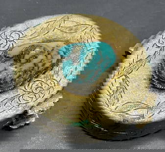 Vintage Turquoise Tn Natural Stone Metal Pill Box: Vintage Turquoise Toned Natural Stone and Metal Pill Box. Etched silver tone metal pill box opens with hinge hardware and features a bezel set natural stone to the lid. Measures approx. .5H x 1.25W in