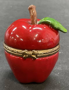Hand Painted Red Apple Porcelain Trinket Box: Hand painted red and green apple motif porcelain trinket box. Measure approx 2 x 2.75 inches. Some scratching and loss to paint. Trinket box, porcelain trinket box, apple trinket box, collectibles, de