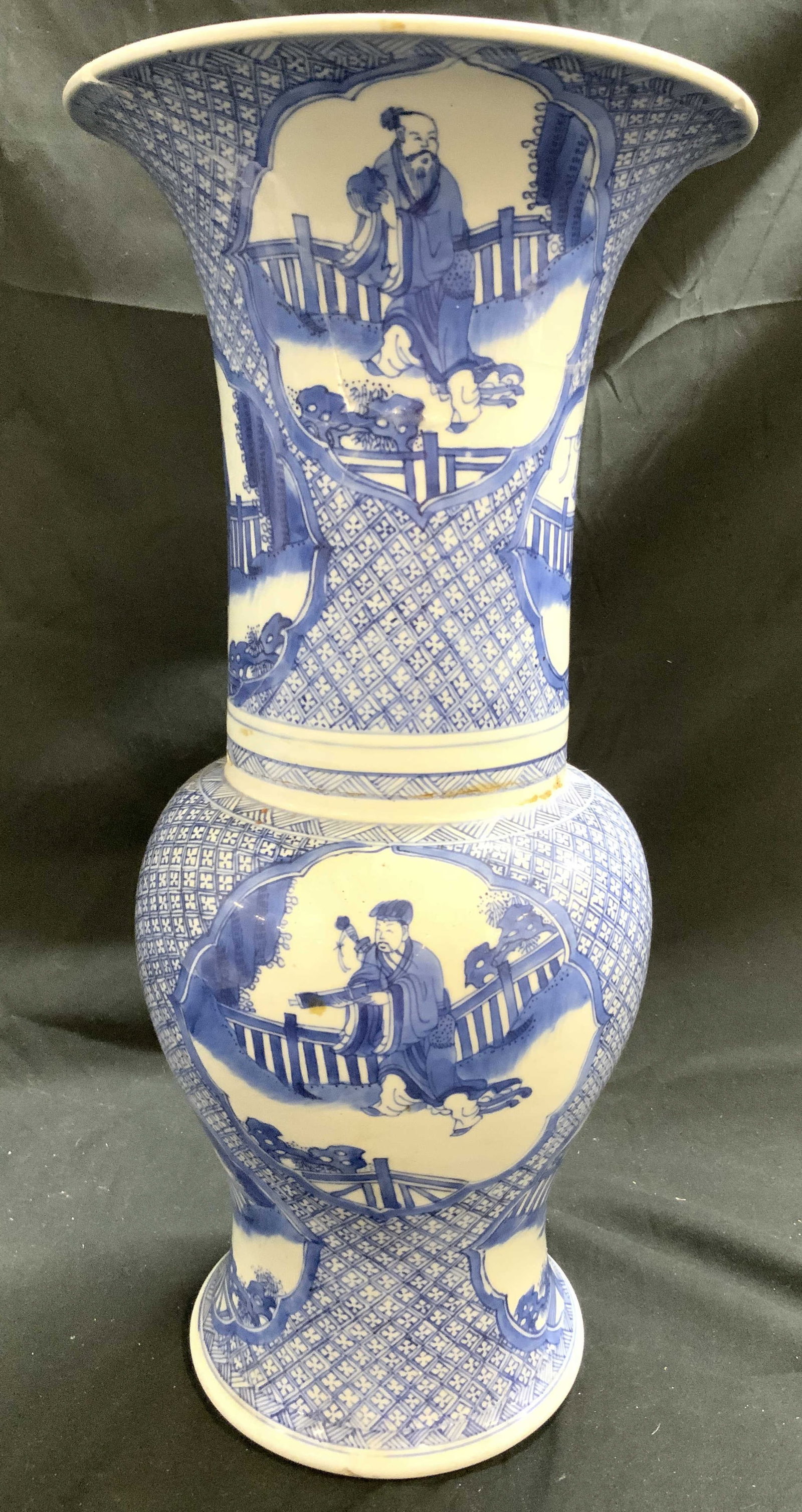 Vtg Asian Blue & Wht 8 Mortals Porc Yen Yen Vase: Vase is vintage and porcelain. Asian blue and white toned 8 Mortals Yen Yen vase. Piece has geometric pattern detailing and depictions of multiple figures. Vase measures approximately 17.5 inches tall