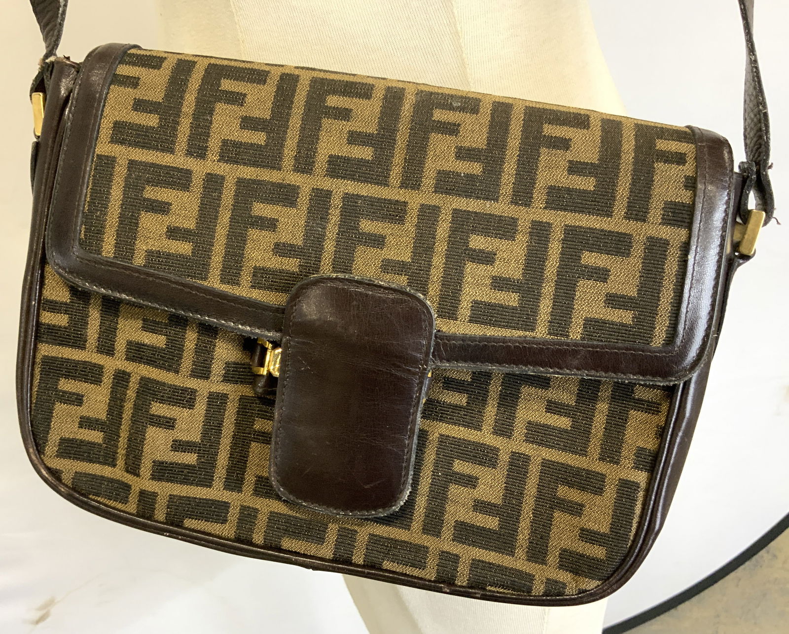 FENDI Monogram Canvas Crossbody Bag ITALY: FENDI Monogram Canvas Crossbody Bag ITALY Canvas crossbody bag featuring a FF monogram pattern. Material is canvas & leather. Signed & marked. Reads FENDI ROMA. MADE IN ITALY. Surface wear consistent