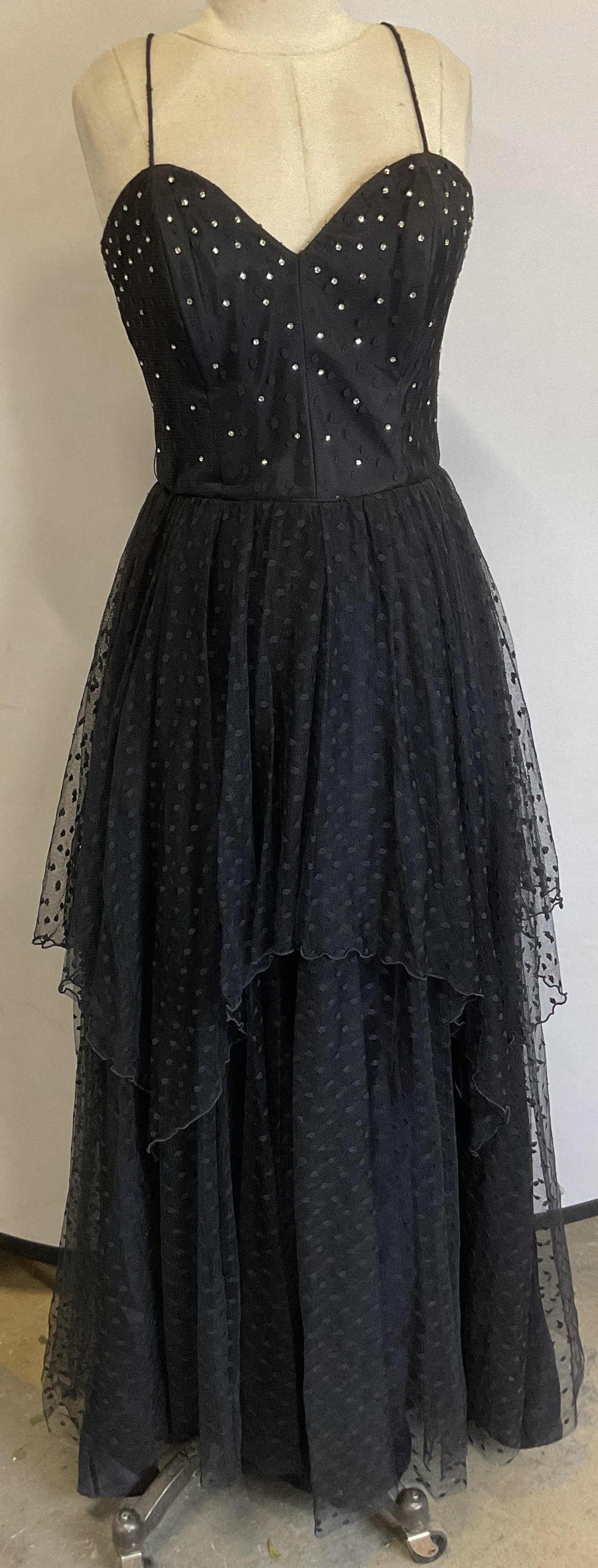 Vtg Noel Sophisticates Black Rhinestone Dress: Vintage Noel sophisticates black rhinestone dress. Sweetheart neckline layered skirt dress. Back zipper. No material tag attached, appears to be synthetic mix. 15 inches across chest. Some surface wea