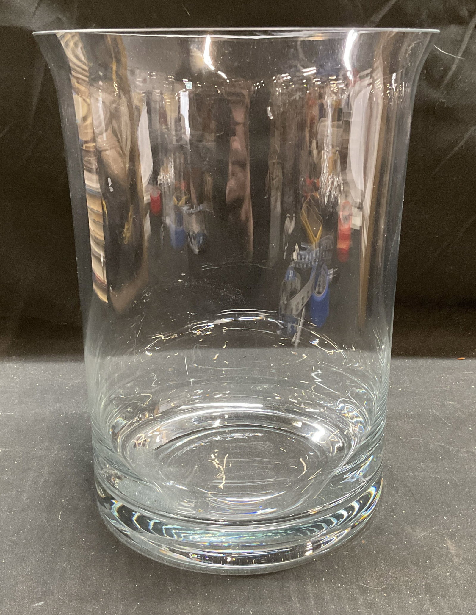 Tall Fluted Glass Vase, 9.75 Inches H: Tall glass vase with fluted rim and thick walled base. Measures approx 7.25 x 9.75 inches. Some scratching. Vase, glass vase, homewares decor, home accessories, homewares, table decor, table accessori