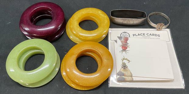 Lot 19 Kitchen Papers Place Holders Napkin Rings: Lot 19 Kitchen Papers place holders, napkins rings. Lot includes 9 Art Deco Bakelite Napkin rings, 8 songbirds placed cards, 1 international sterling D? napkin holder, 1 round J? metal napkin ring. Ba