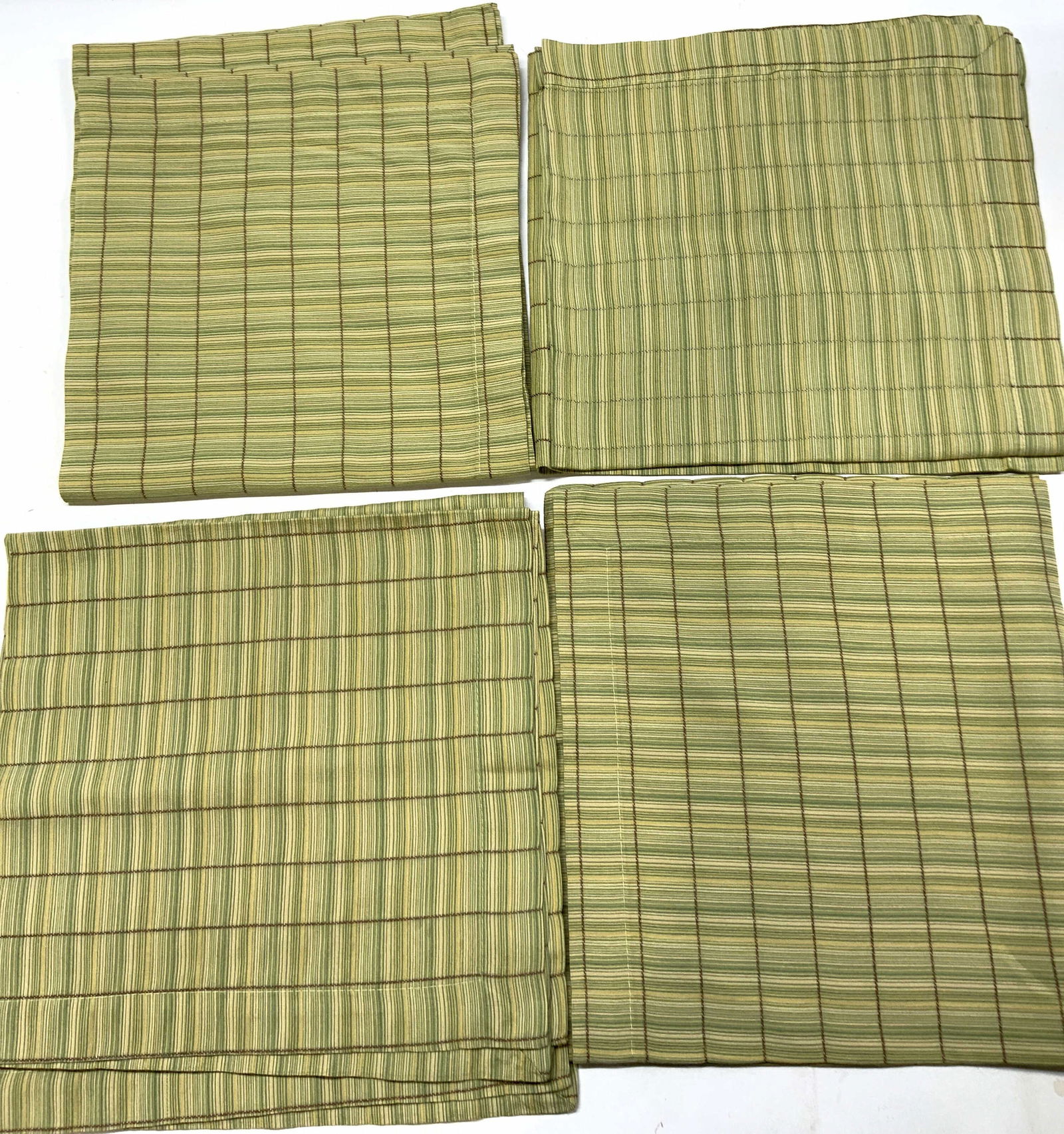 Lot 7+ Green Vertical Striped Linen Napkins: Lot 7+ Green Vertical Striped Linen Napkins Napkins feature vertical stripes in varying shades of green, yellow & brown. Surface wear consistent to age, use & exposure. Measurements: length 24.1in x w