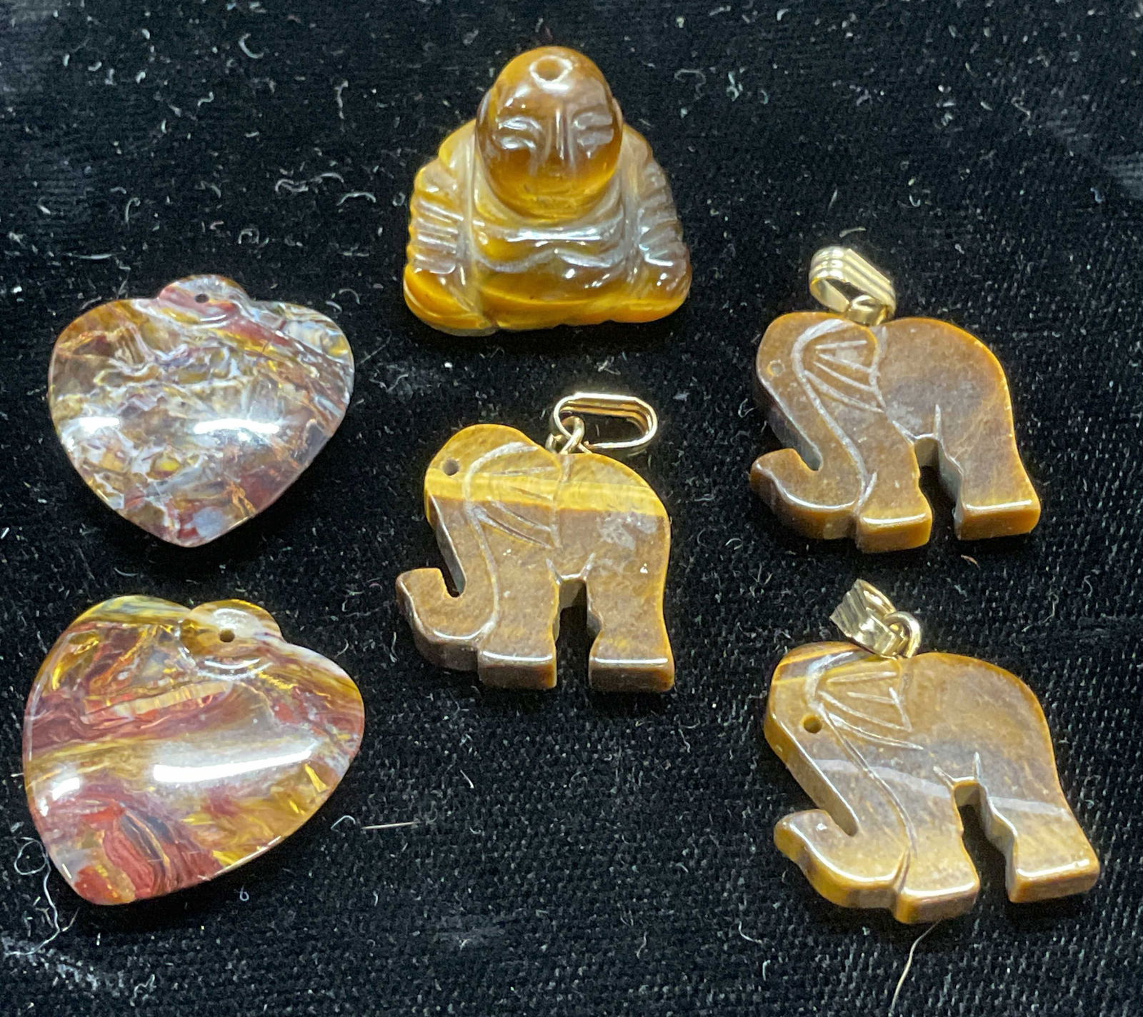 Lot 6 Carved Tigers Eye Buddha, Elephant Pendants (1 of 7)