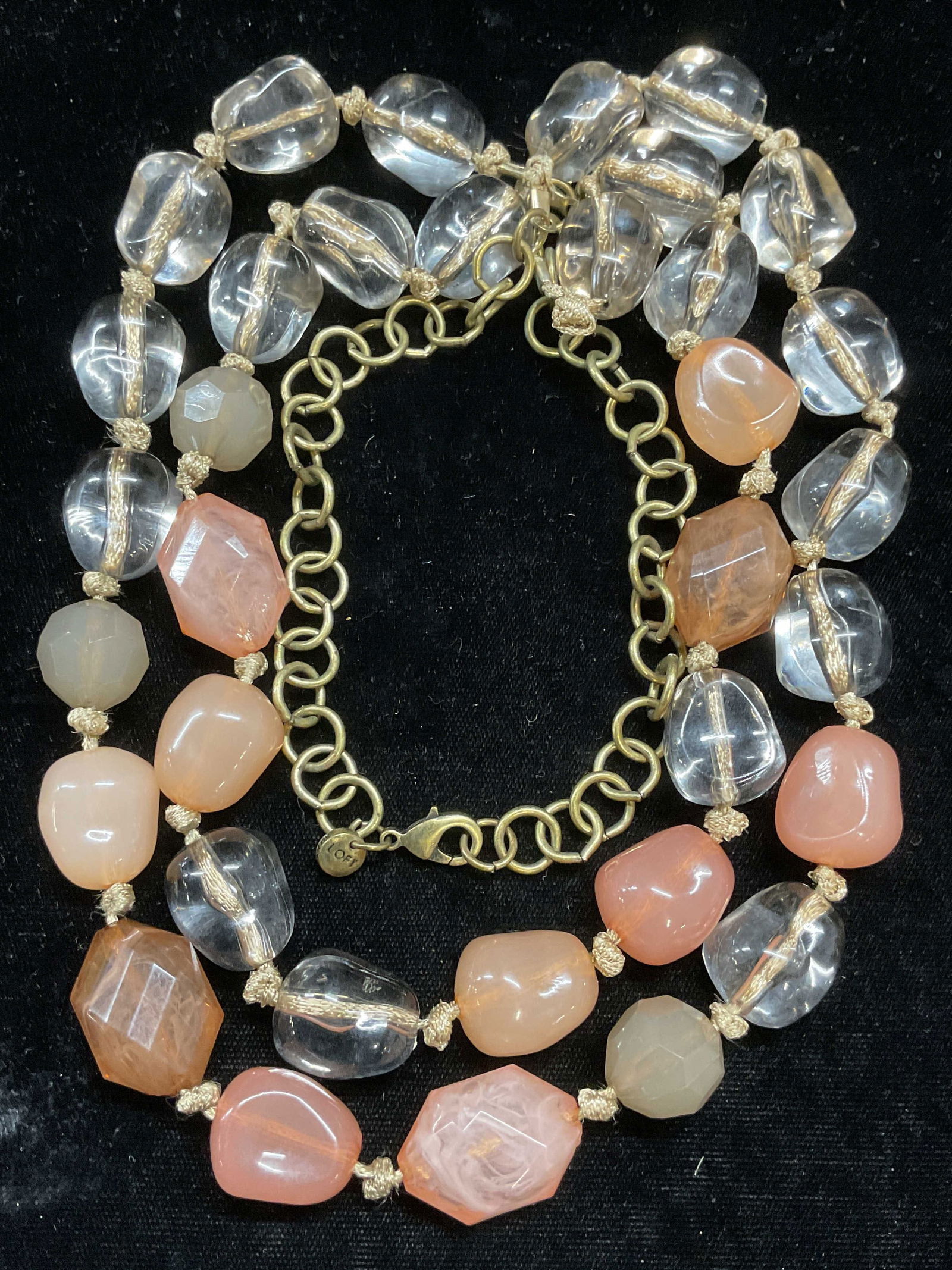 Loft Gold Tone Pink Clear Lucite Necklace: Signed Loft gold tone pink and clear lucite beaded double strand necklace. Drop length approx 14 inches. Some wear including scratching. Jewelry, estate jewelry, costume jewelry, fashion jewelry, cock