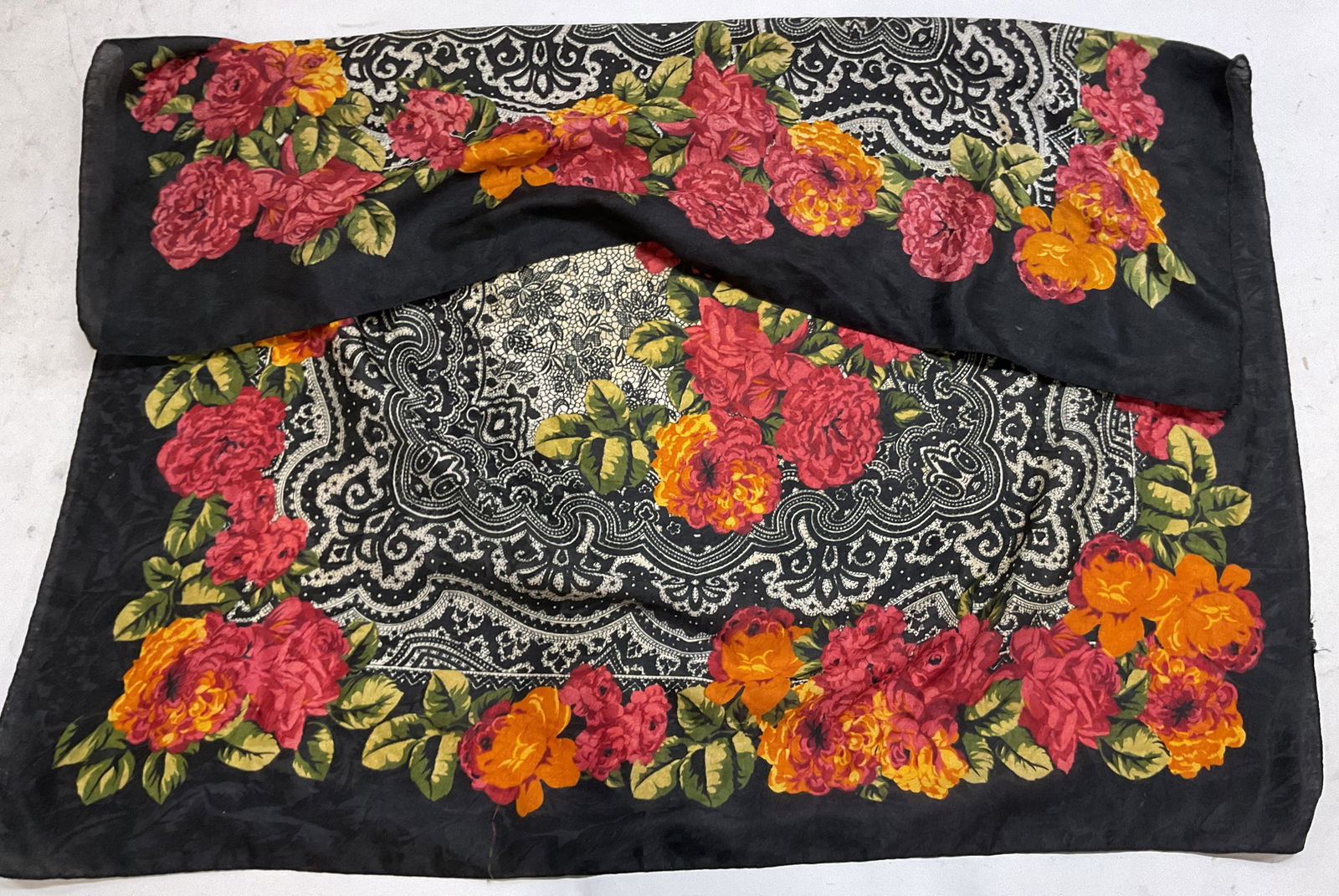 Vtg Black Silk Floral Bandanna Square Scarf: Vintage black floral bandanna square scarf. Black bandanna with red and orange floral patterns. Measures 35 inches. Material tag not attached, appears to be silk or synthetic cotton mix. Some surface