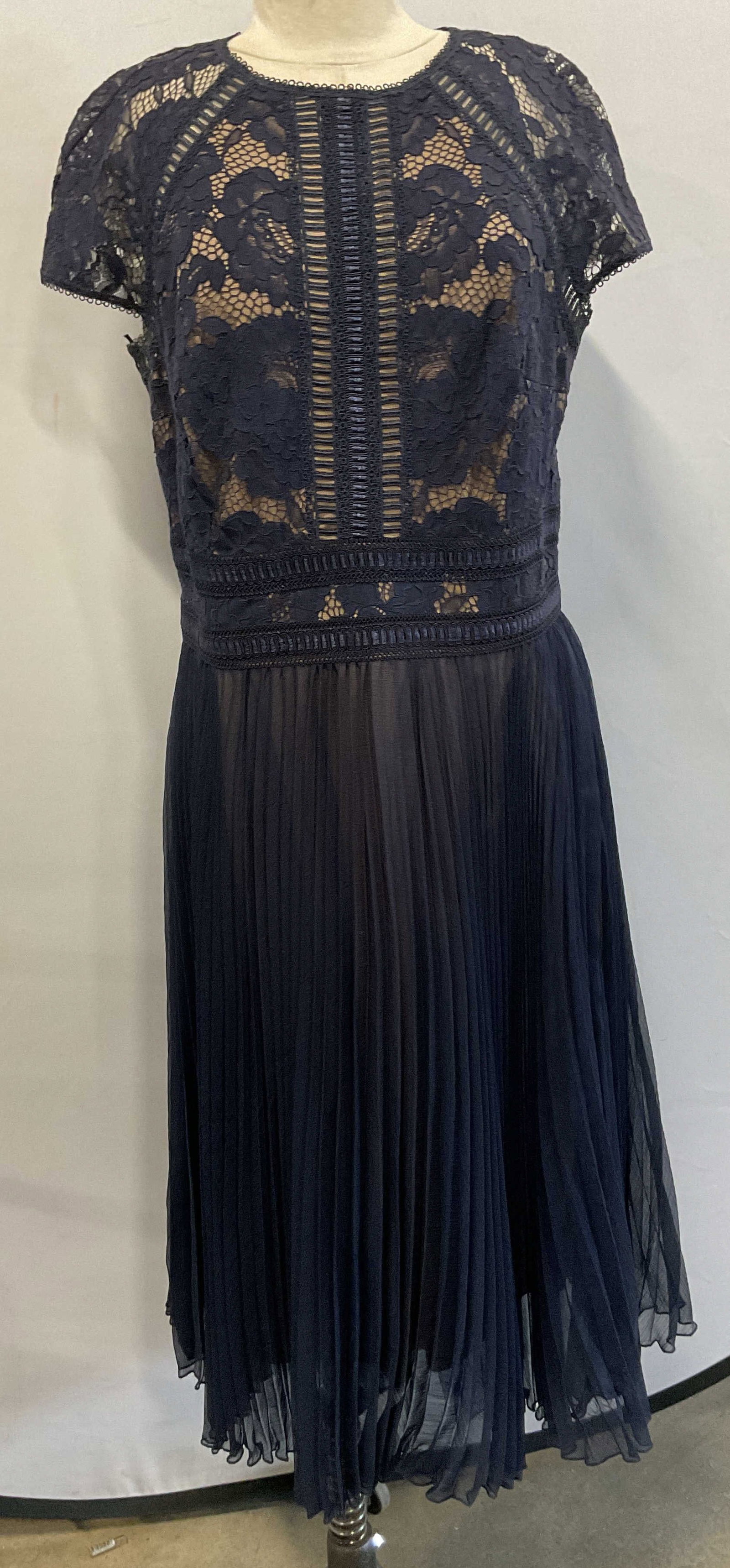 Vtg Tadashi Shoji Adelia Midnight Polyester Dress: Vintage Tadashi Shoji Adelia midnight polyester dress. Textured short sleeve, embroidered and appliqued bodice. Accordion-pleated crinkle chiffon skirt. Color midnight. Back zipper, fully lined. Size