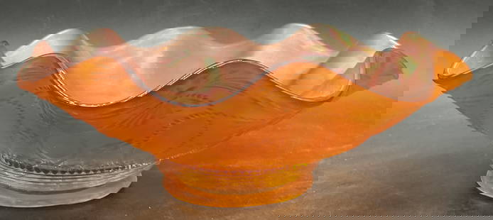Vintage Carnival Glass Ruffle Rim Bowl: Vintage Carnival Glass Ruffle Rim Bowl. Iridescent orange hues throughout. Raised glasswork details. Measures approx. 3H x 7.25W in. Seam present. Surface wear consistent with age, use, and exposure.