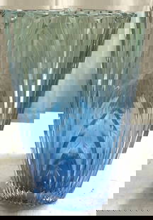 STUDIO NOVA Vtg Ribbed Art Glass Vase: Vase appears to be STUDIO NOVA (No apparent markings). Piece is light blue toned and glass. Vase is ribbed. Teeth to outer rim. Vase is vintage. Piece measures approximately 10.25 inches tall 5 inches